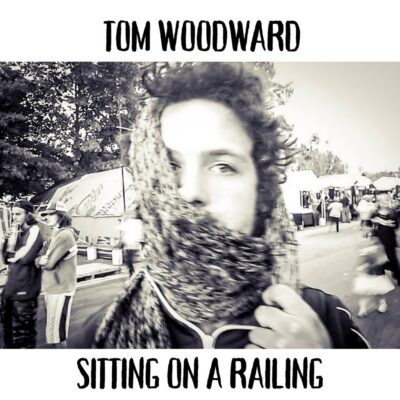 Sitting On A Railing