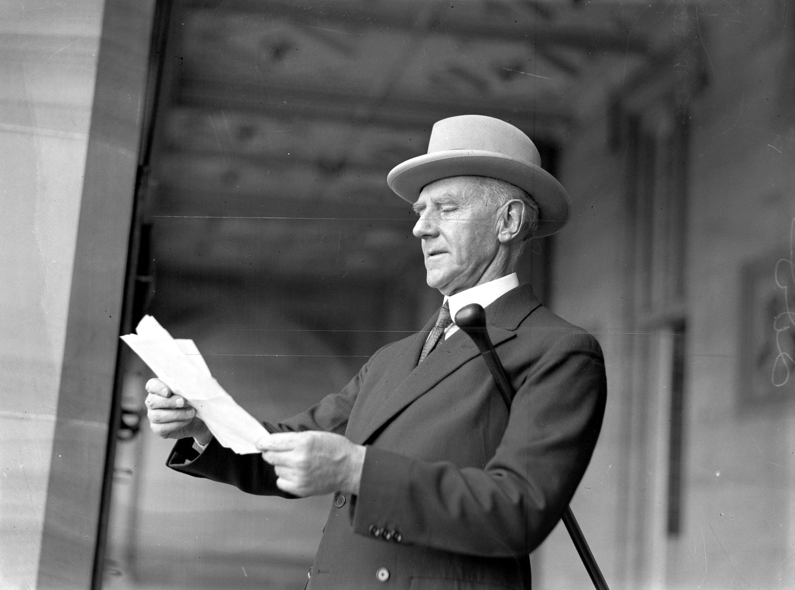 Governor of New South Wales Sir Dudley de Chair reading from a sheet of paper